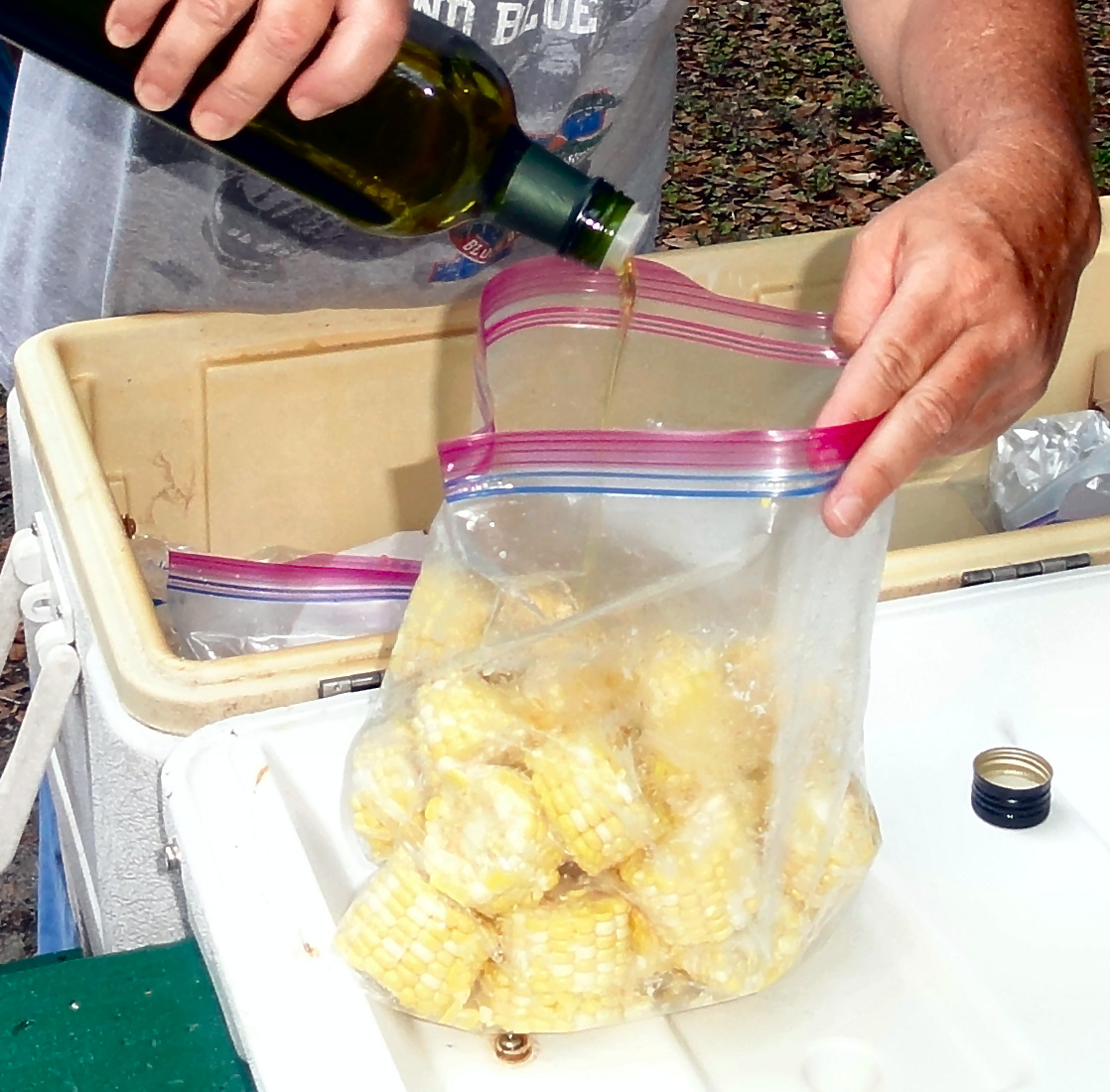 Pour Oil on the Corn